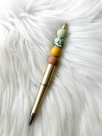 Daisies - Green/Yellow/Mauve on Gold Pen