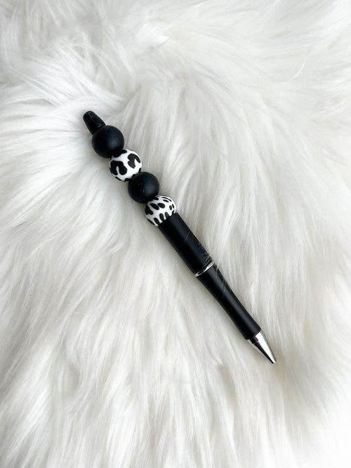 Black/White Cow on Black Pen